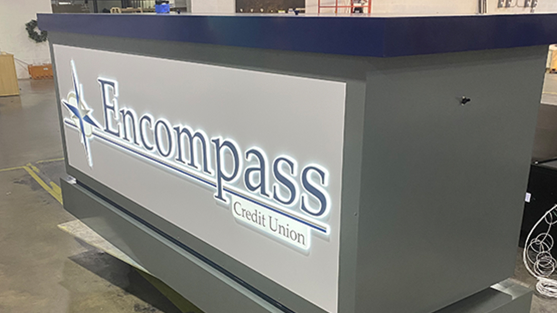Encompass Credit Union Outdoor building sign being packaged in factory getting ready for shipment
