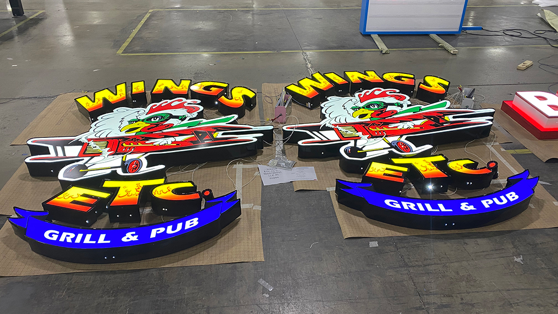 Wings Grill & Pub building sign getting ready for shipment to new location