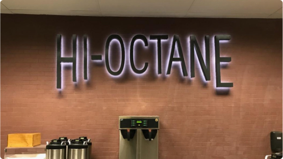 Hi-Octane LED light sign above coffee bar