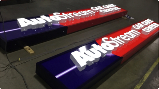 Auto Stream Car Care Center building sign laying on factory floor getting ready for shipment