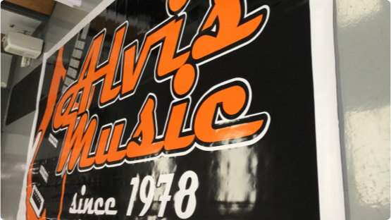 Alvis music printed on paper sign