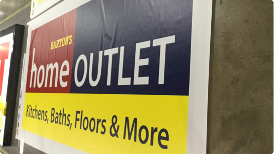 Barton's Home outlet printed on paper sign