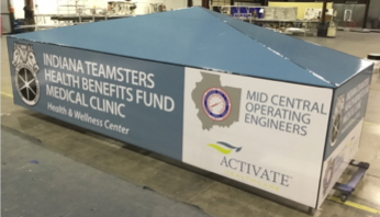 Indiana Teamsters Health Benefits Fund Medical Clinic building sign laying on factory floor getting ready for shipment